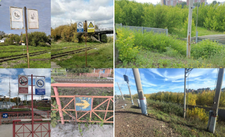 Пешеходные дорожки и железнодорожные знаки на перроне.